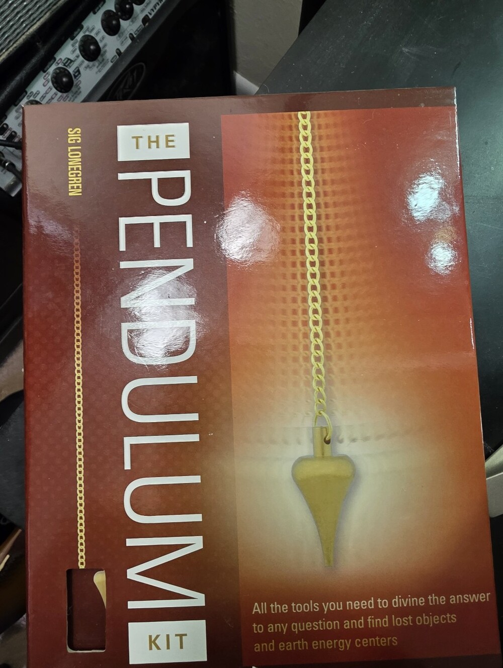 The Pendulum Kit - Gold Pendant on Brown Box
